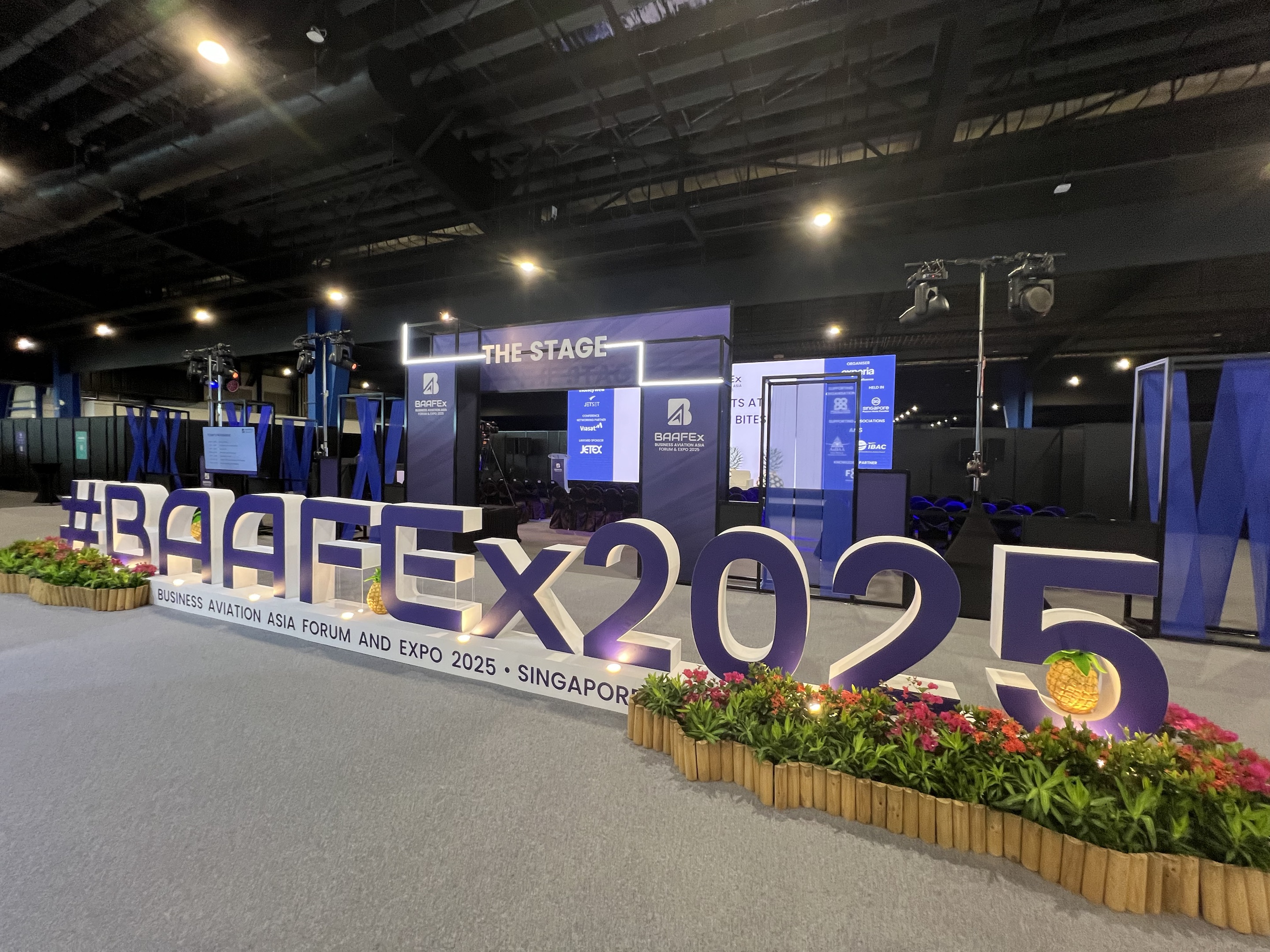 Official opening of BAAFEx 2025, showcasing the event stage with branding and a formal setting.